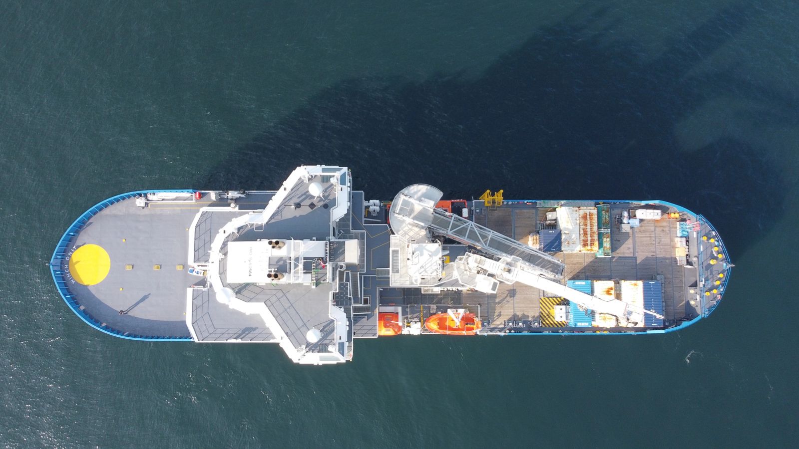 Aerial view of offshore service vessel with deck crane